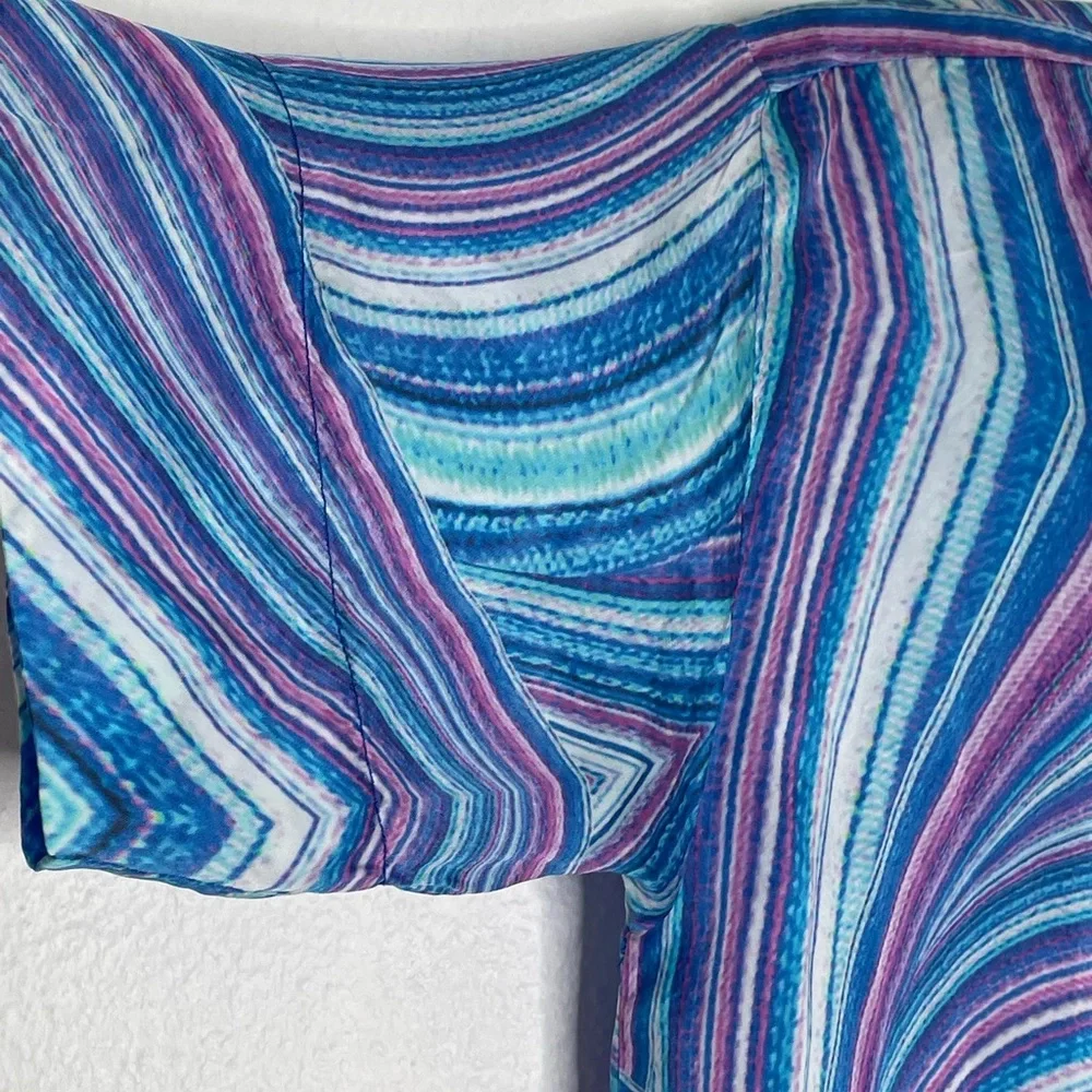 Frankie’s Bikinis Fifi Sustainable blue purple swirl cover up shirt. Size XS